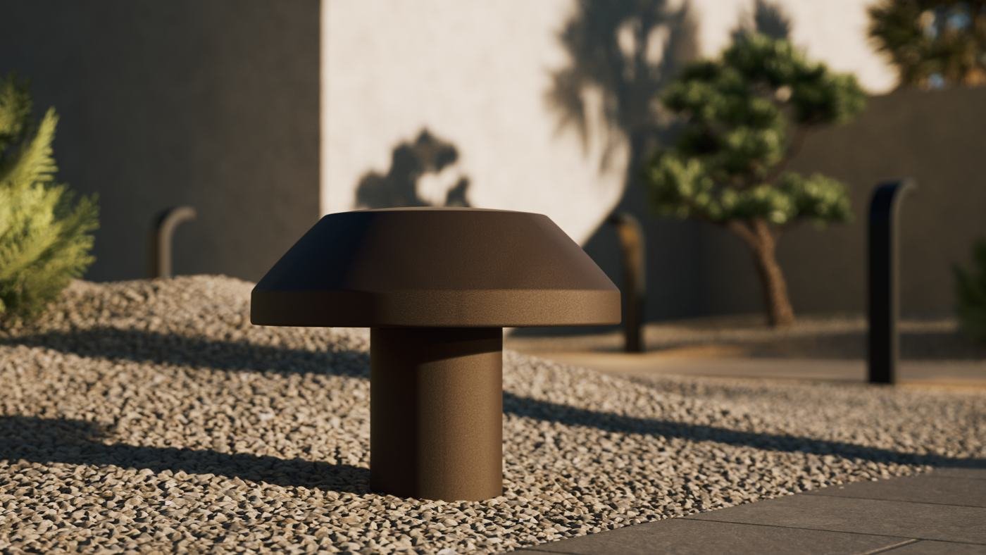 Triad bollard speaker on a gravel path